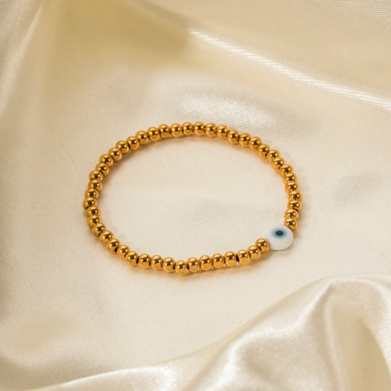 Beads design bracelet with blue evil eye