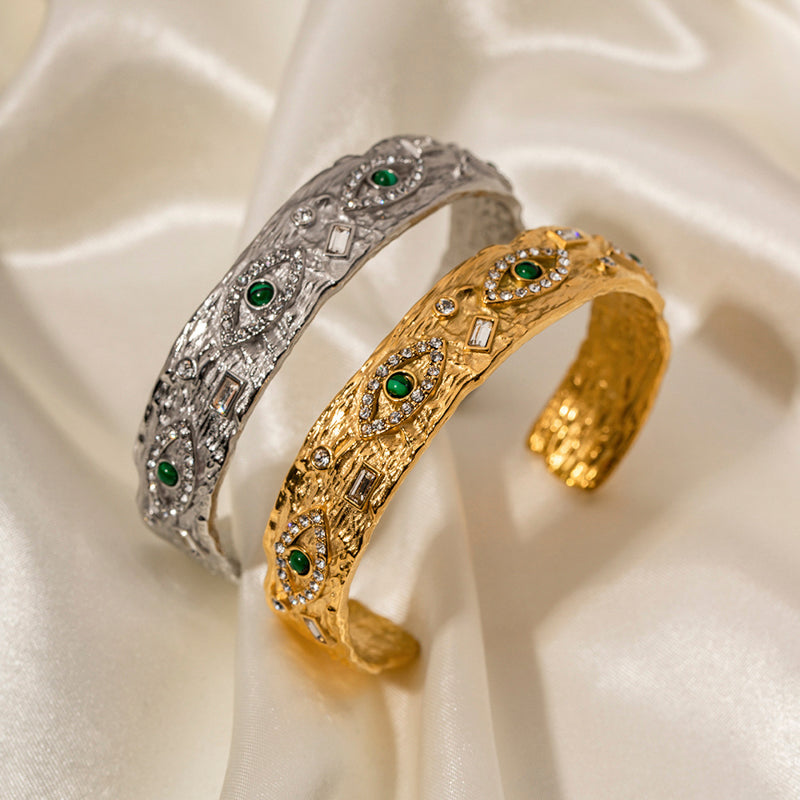 Emerald-jeweled Eye bangle in Silver & Golden