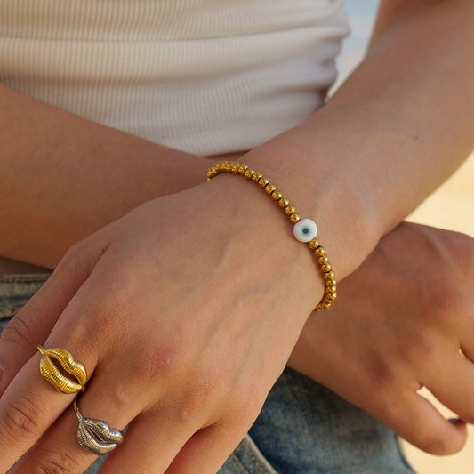 Beads design bracelet with blue evil eye