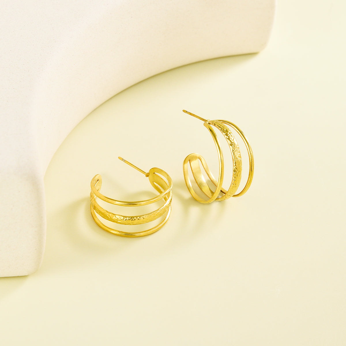 Classy triple layered golden earrings