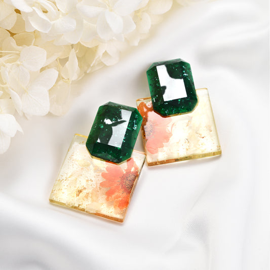 Blooming flower earrings with green sophisticated holders