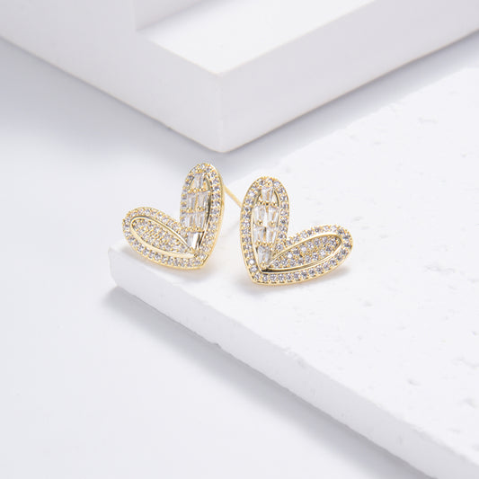 Double-layered golden heart-shaped earrings