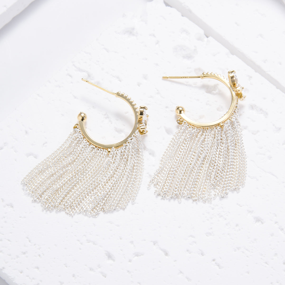 Classic golden butterfly earrings with silver tassels