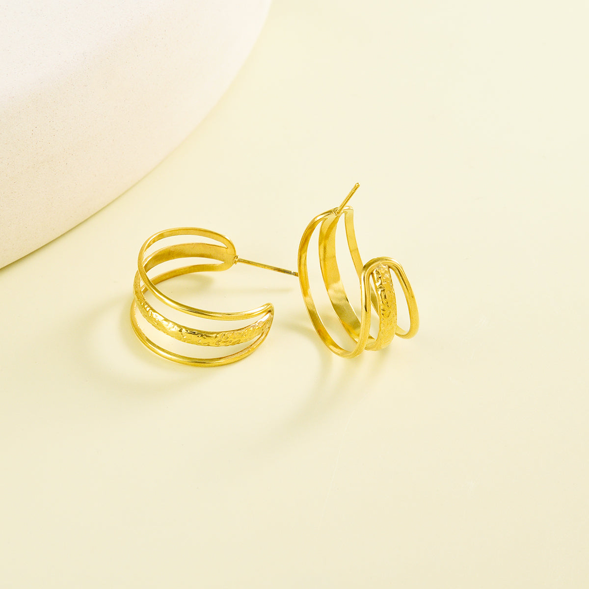 Classy triple layered golden earrings