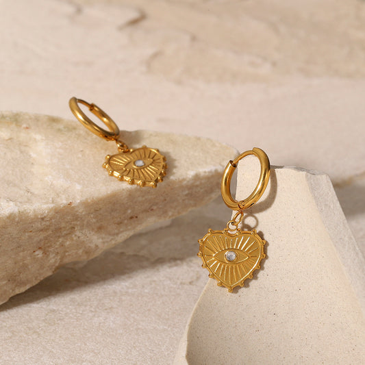 Virtuous eye design golden earrings