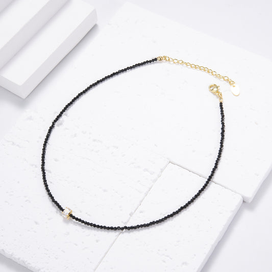 Square-cut crystal on black beads necklace