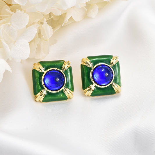 Source of oasis blue and green earrings with golden stripes