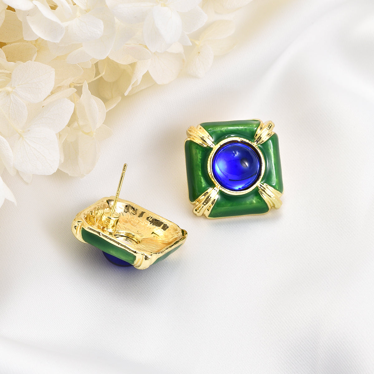 Source of oasis blue and green earrings with golden stripes